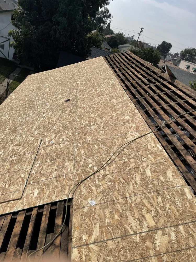 Slide of Oscar Roofing  services