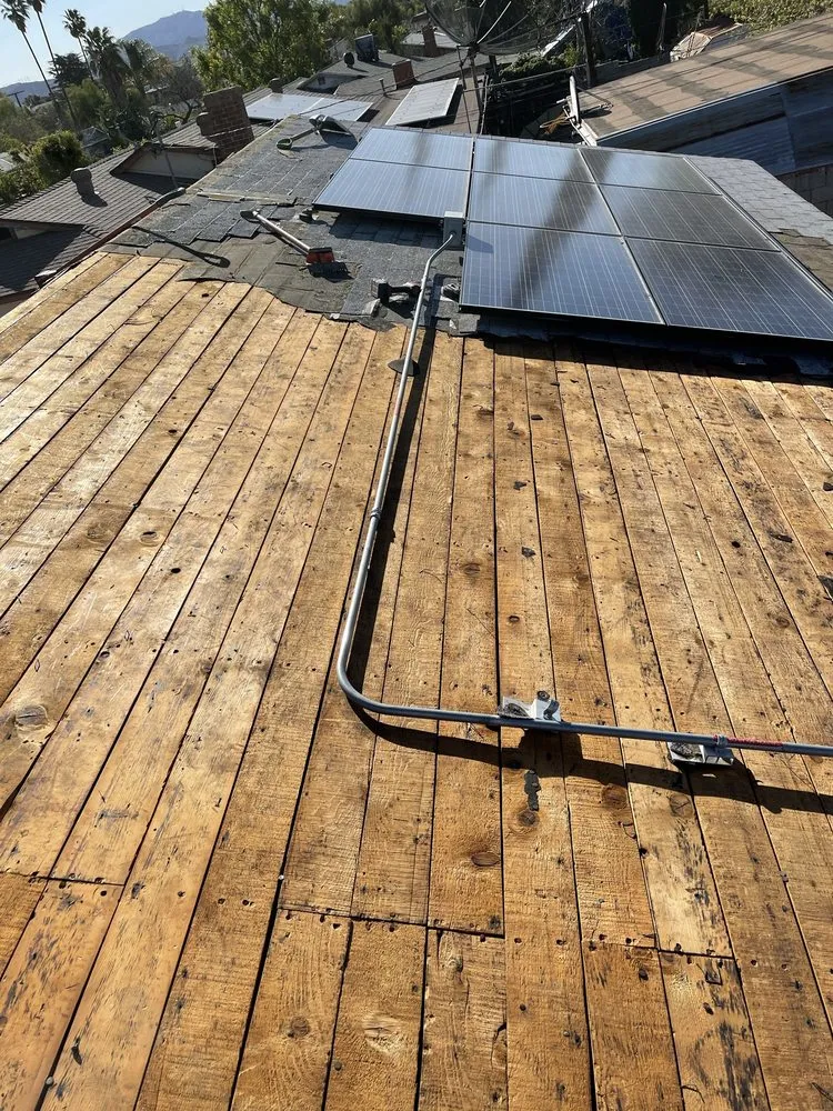 Slide of Oscar Roofing  services