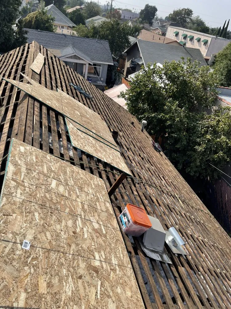 Slide of Oscar Roofing  services