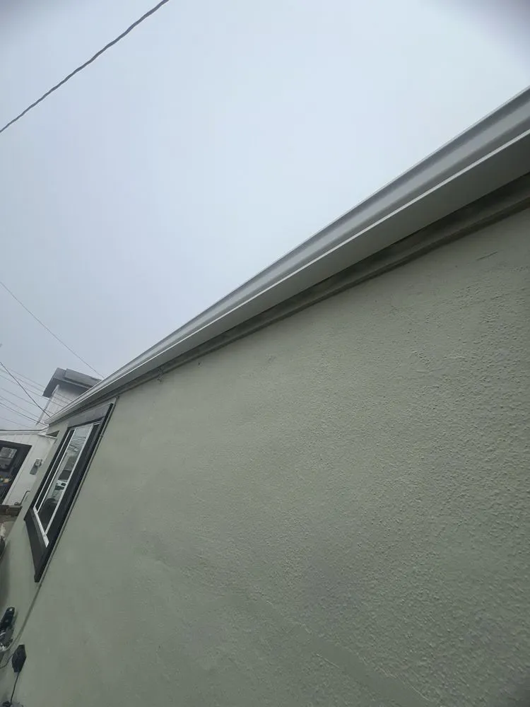 Slide of Oscar's Gutters & Downspouts