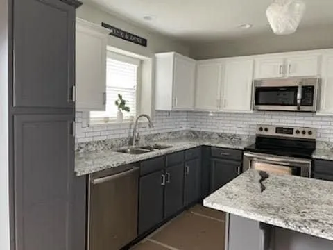 Oscars Painting And Solutions Logo