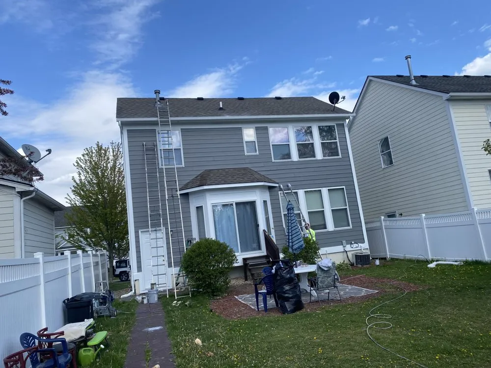 Slide of Oscars Painting Construction & Roofing