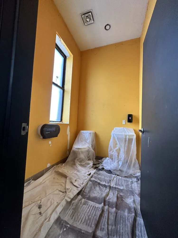 Slide of Oscars Painting Construction & Roofing