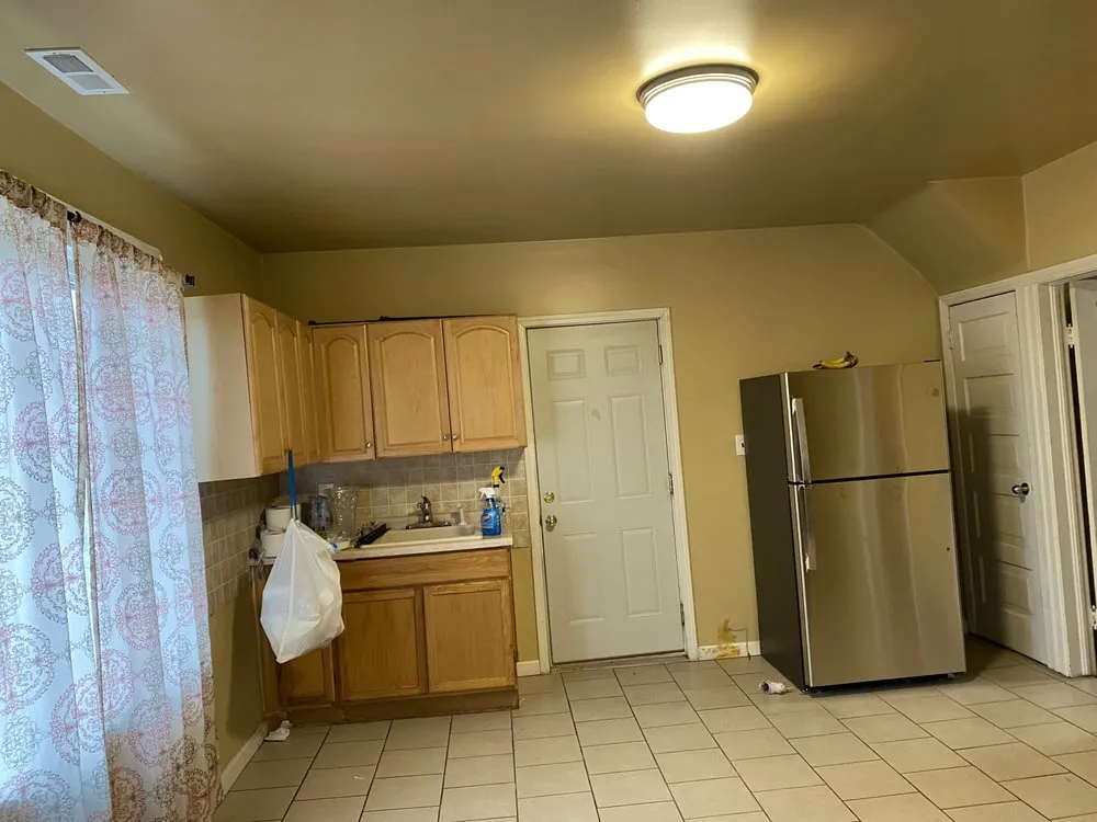 Slide of Oscars Painting Construction & Roofing