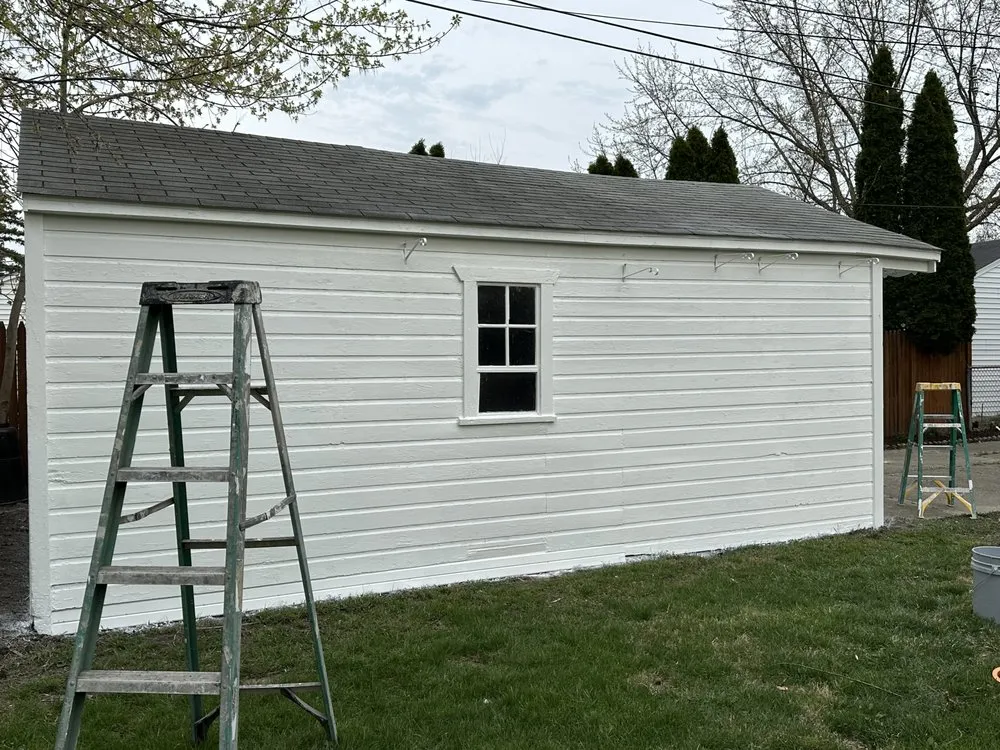 Slide of Oscars Painting Construction & Roofing