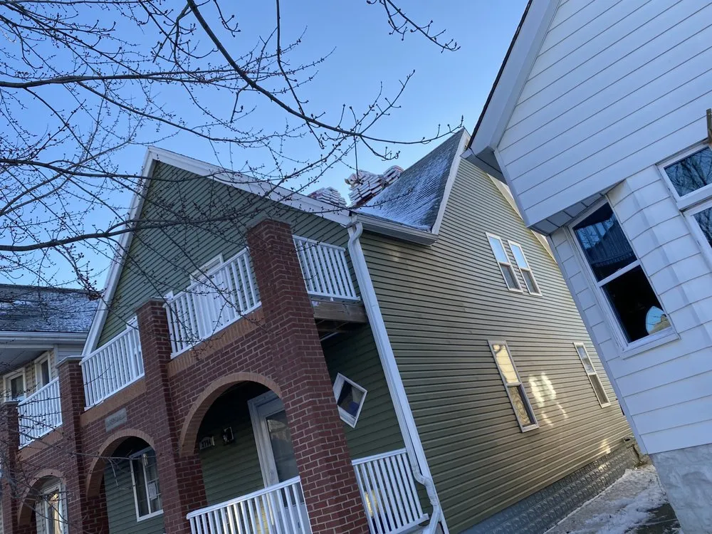 Slide of Oscars Painting Construction & Roofing