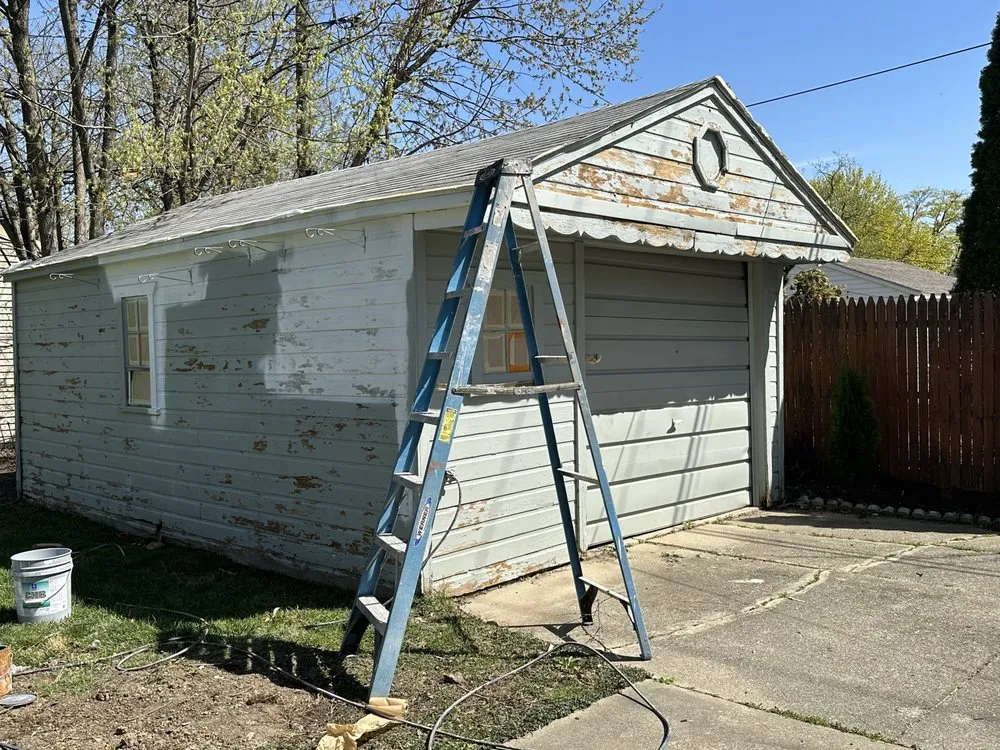 Slide of Oscars Painting Construction & Roofing