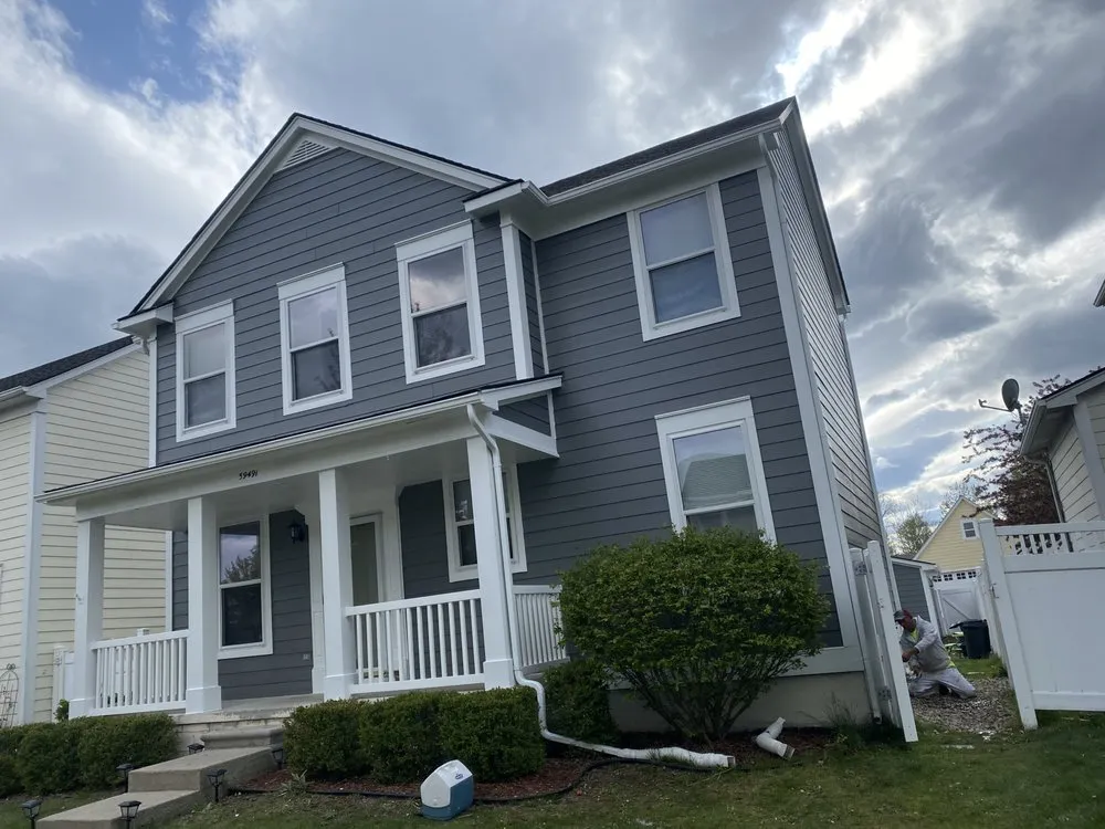 Slide of Oscars Painting Construction & Roofing