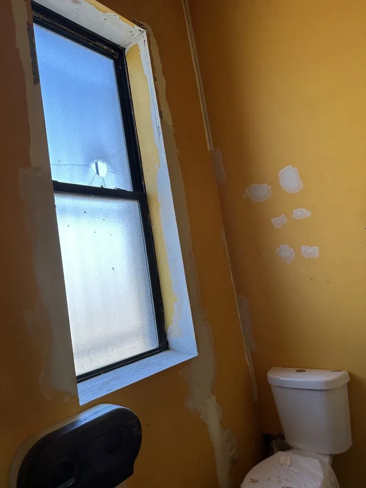 Slide of Oscars Painting Construction & Roofing