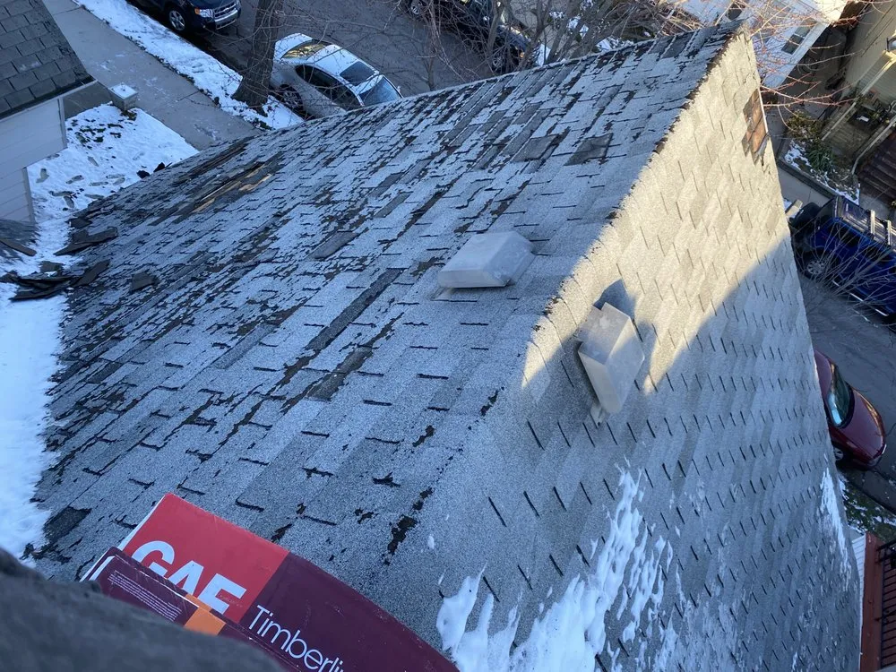 Slide of Oscars Painting Construction & Roofing