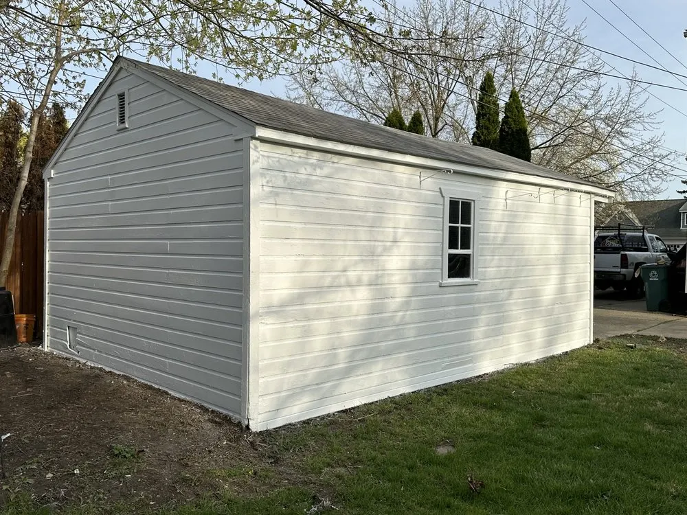 Slide of Oscars Painting Construction & Roofing