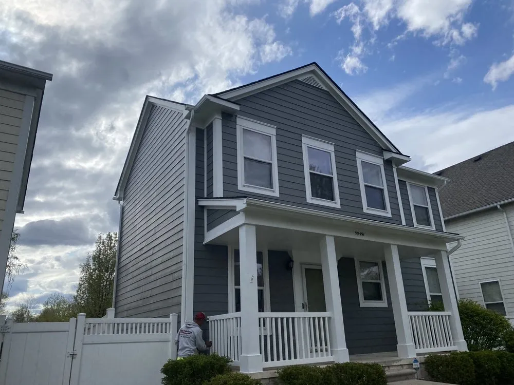 Slide of Oscars Painting Construction & Roofing