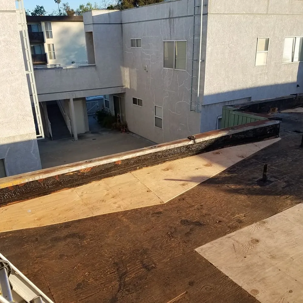 Slide of Oscar's Roofing