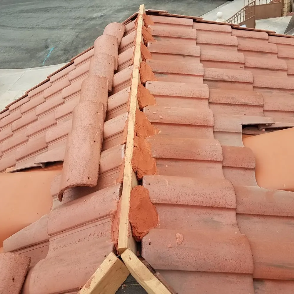 Slide of Oscar's Roofing