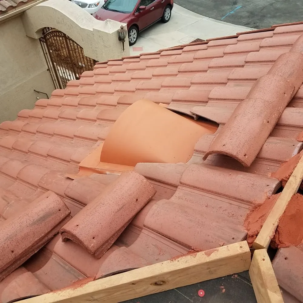 Slide of Oscar's Roofing