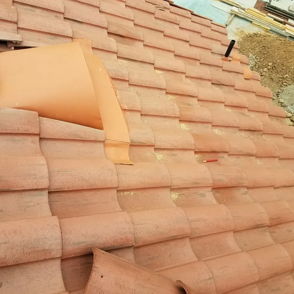 Slide of Oscar's Roofing