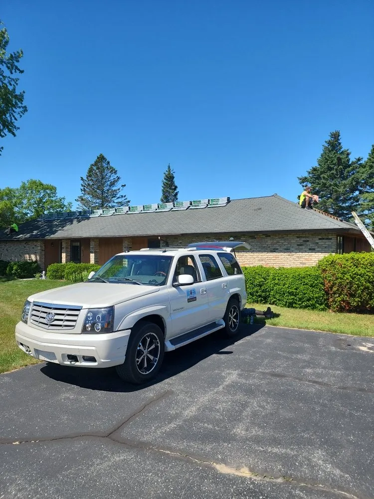 Expert flat roof repair in Harrisville, MI by Oscoda Roofing