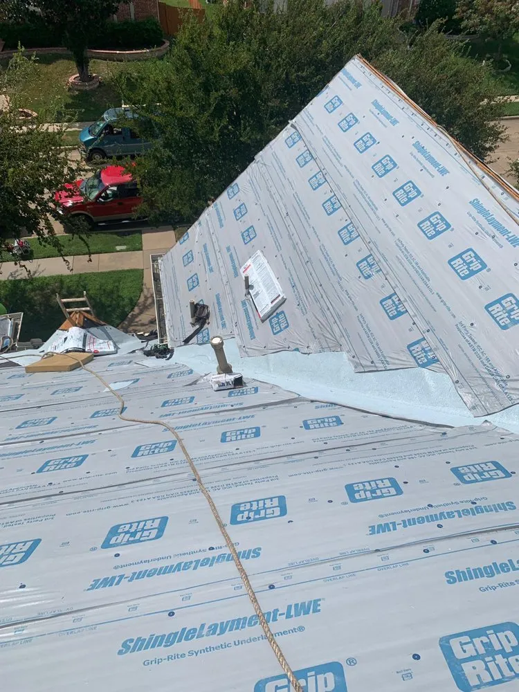 Slide of Osman Roofing Company