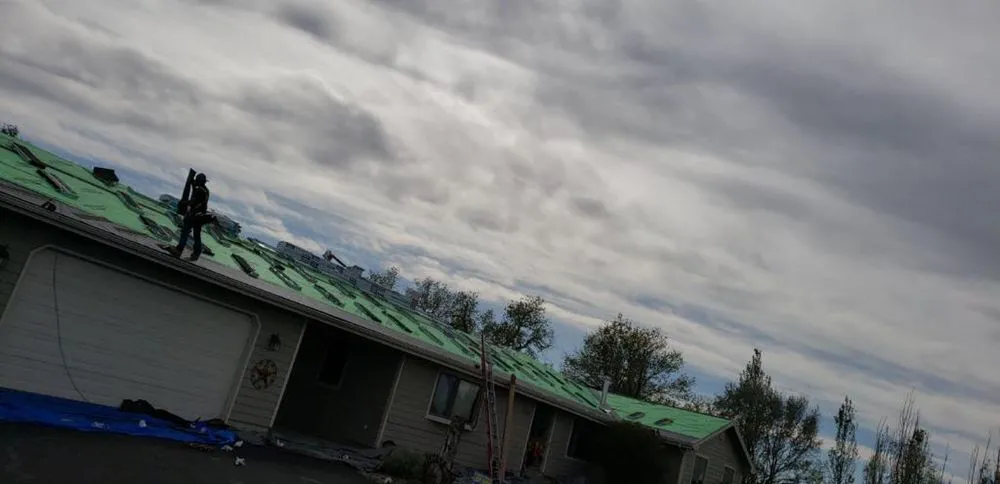 Slide of Osman Roofing Company