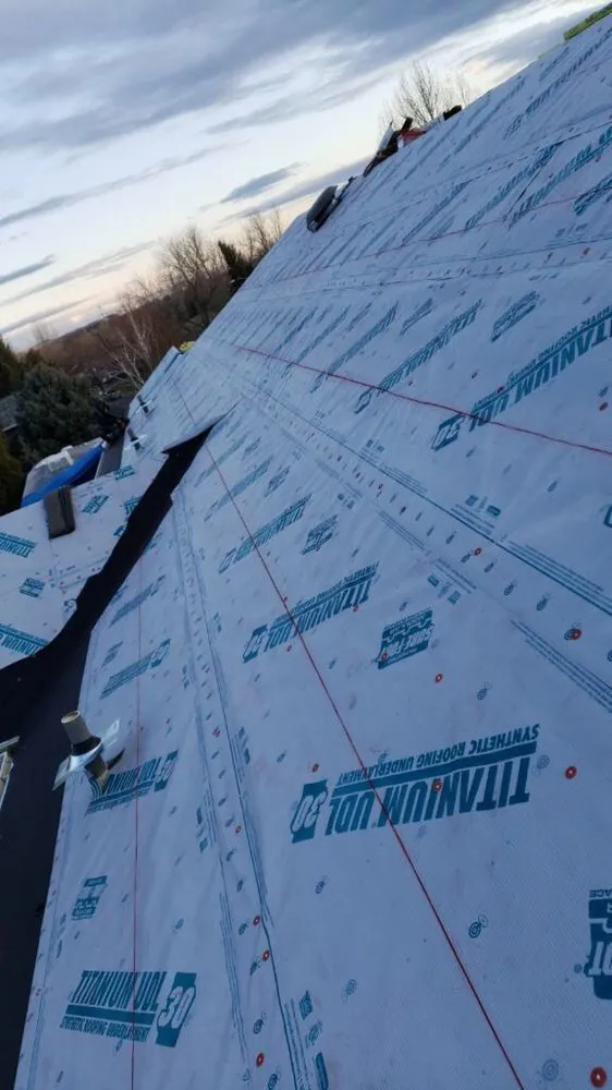 Slide of Osman Roofing Company