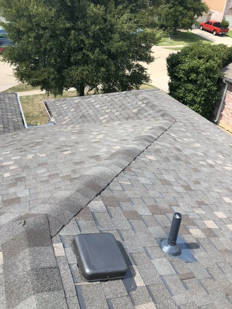 Slide of Osman Roofing Company