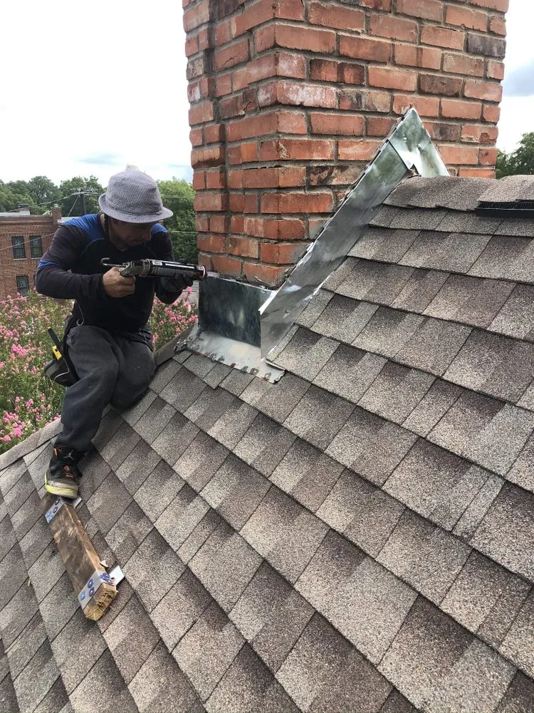 Slide of Osman Roofing Company