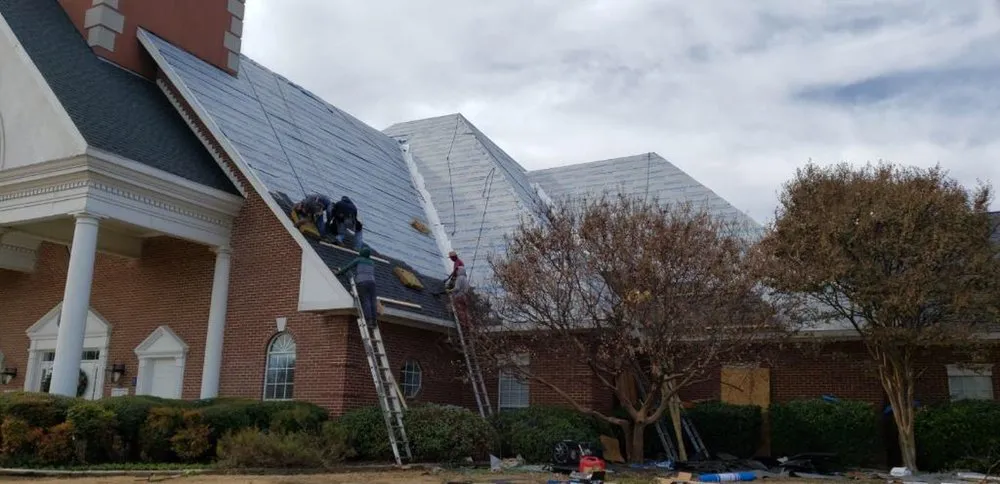 Slide of Osman Roofing Company