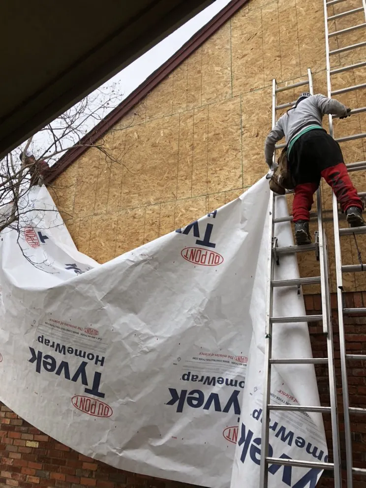 Slide of Osman Roofing Company