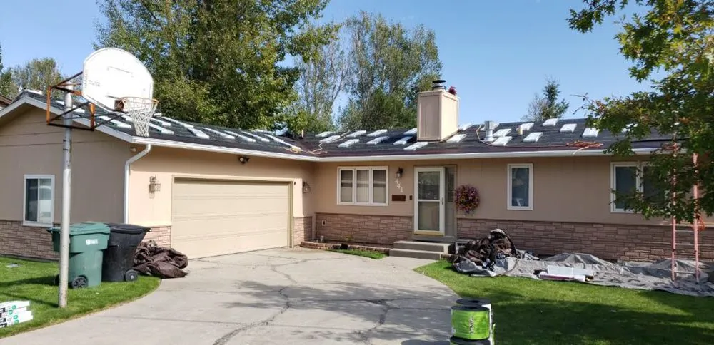 Slide of Osman Roofing Company