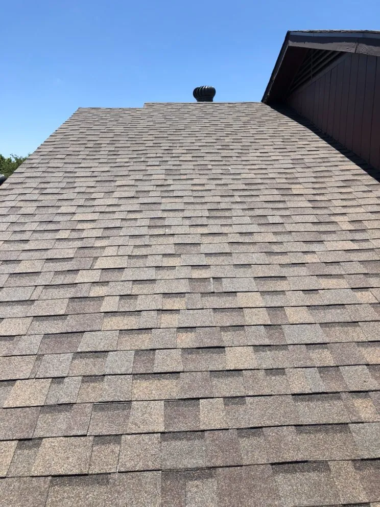 Slide of Osman Roofing Company