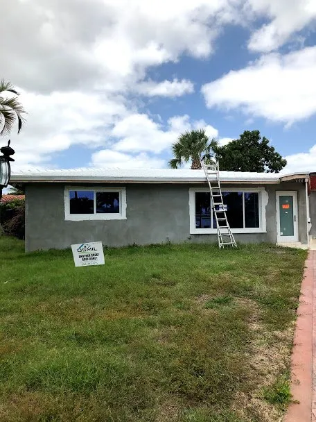 Slide of Osmil Roofing