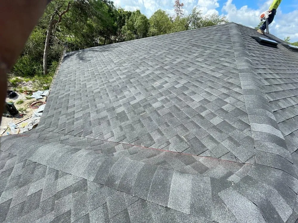 Slide of Osmin Roofing