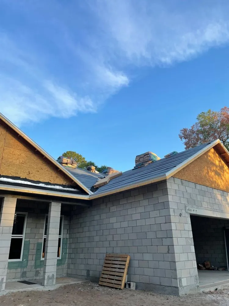 Slide of Osmin Roofing