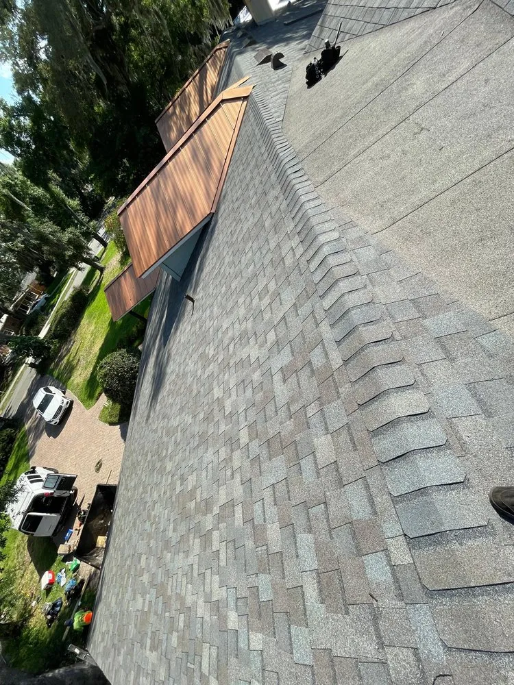 Slide of Osmin Roofing