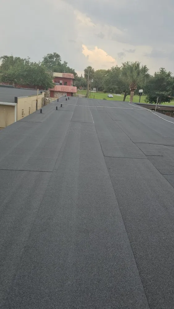 Slide of Osmin Roofing