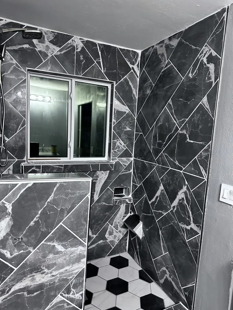 Slide of Oster Roofing & Remodel