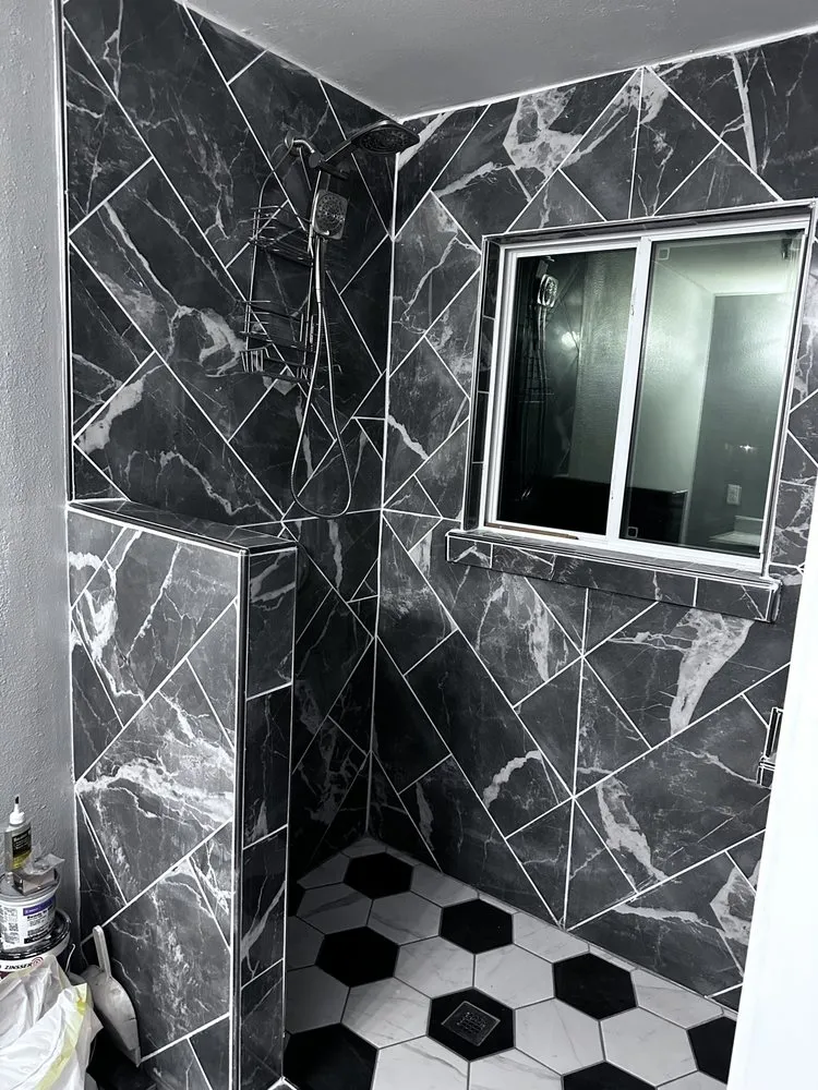 Slide of Oster Roofing & Remodel