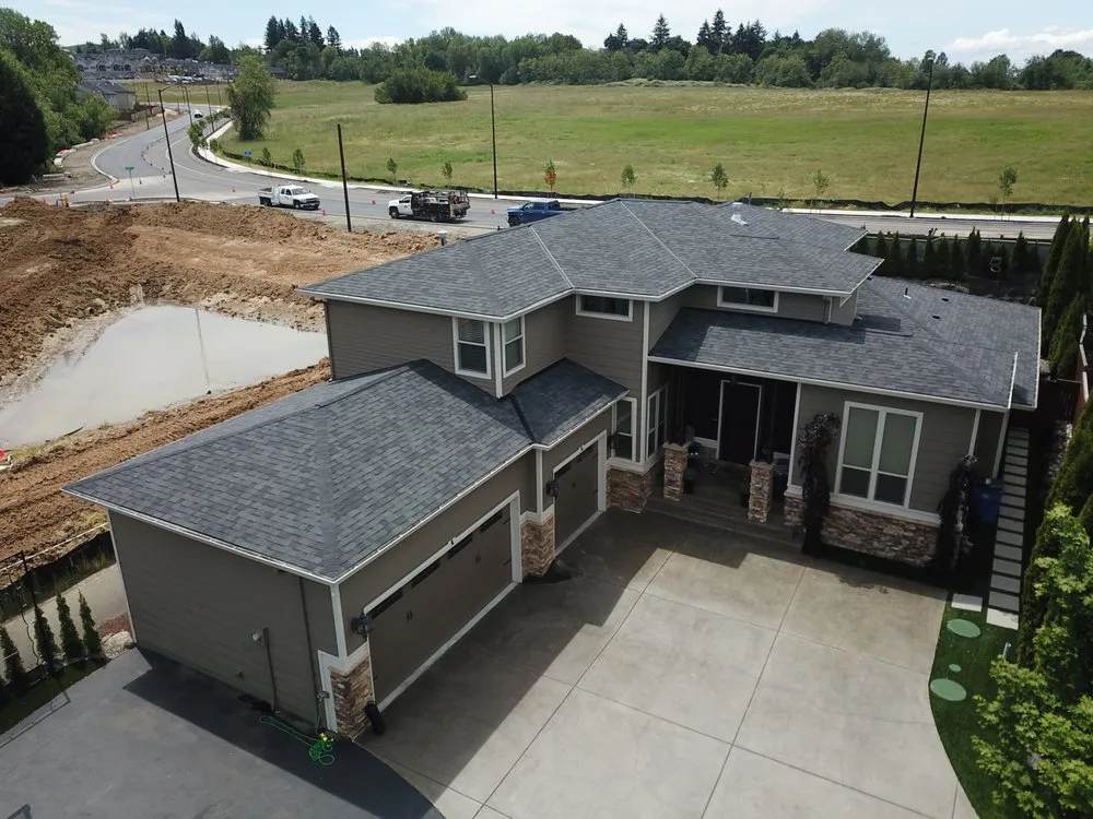 Slide of Oswego Roofing