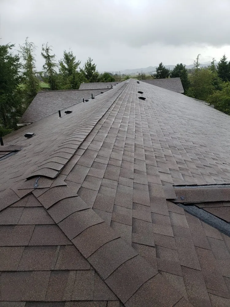 Slide of Oswego Roofing