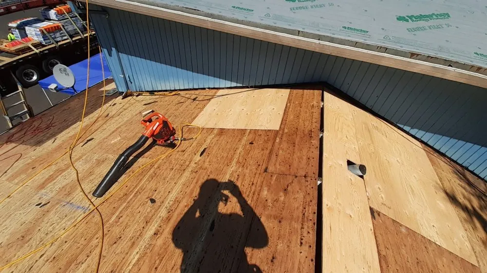 Slide of Oswego Roofing