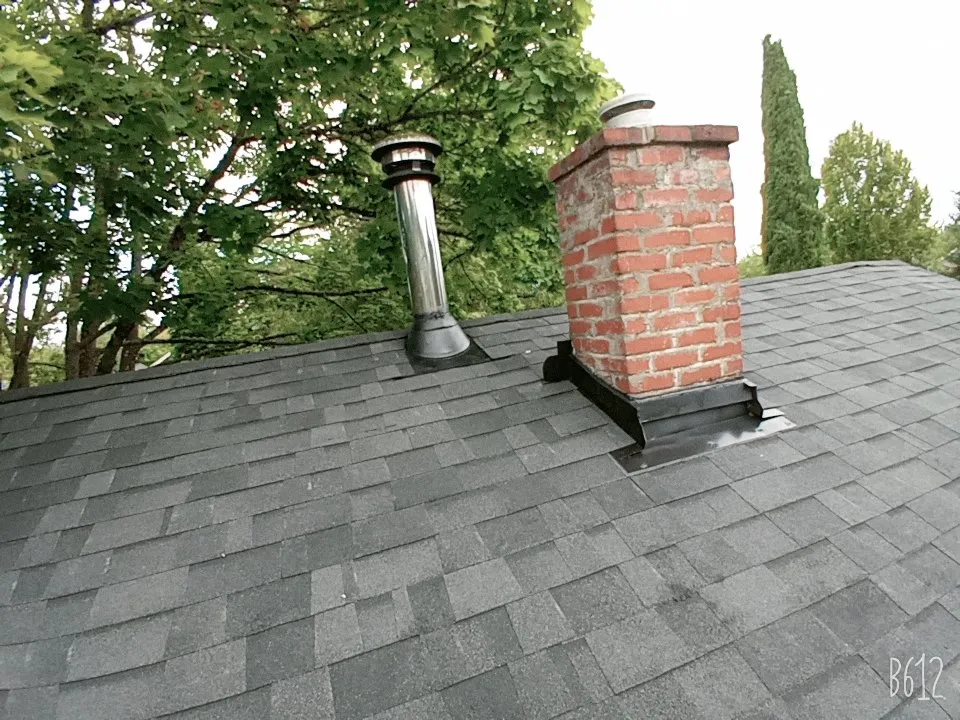 Slide of Oswego Roofing