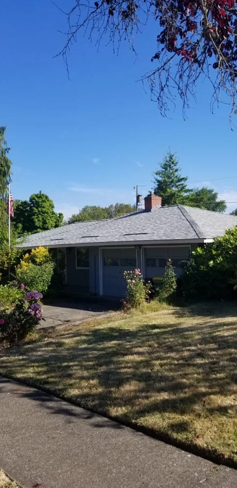 Slide of Oswego Roofing