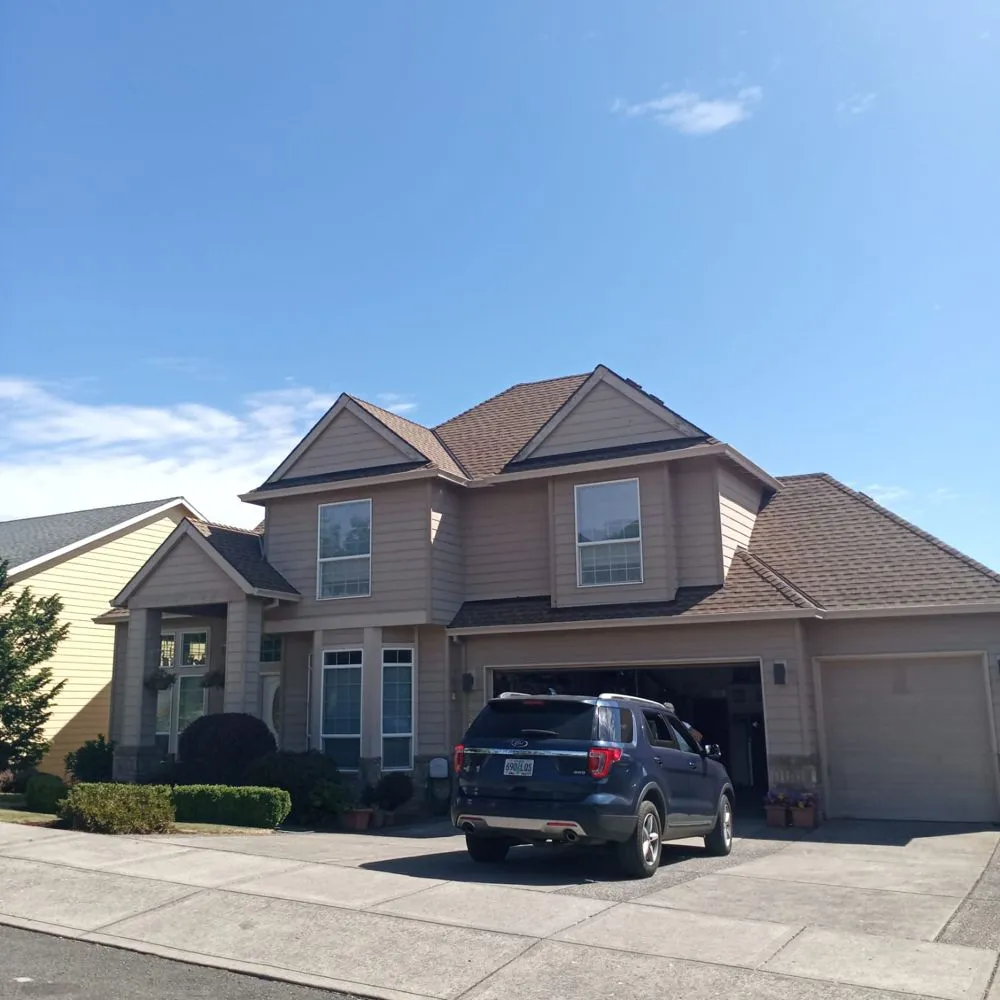 Slide of Oswego Roofing