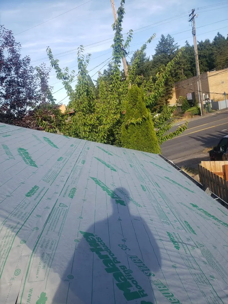 Slide of Oswego Roofing