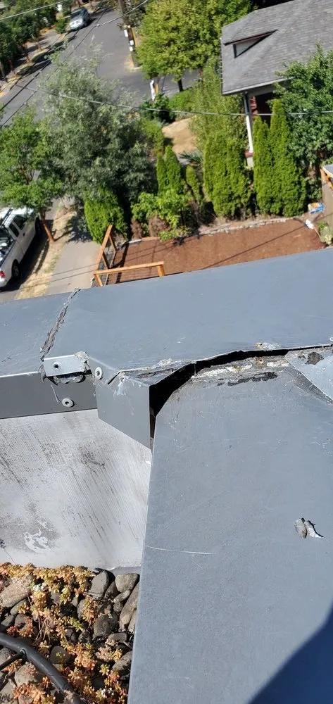 Slide of Oswego Roofing