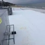 Slide of Otten's Custom Roofing