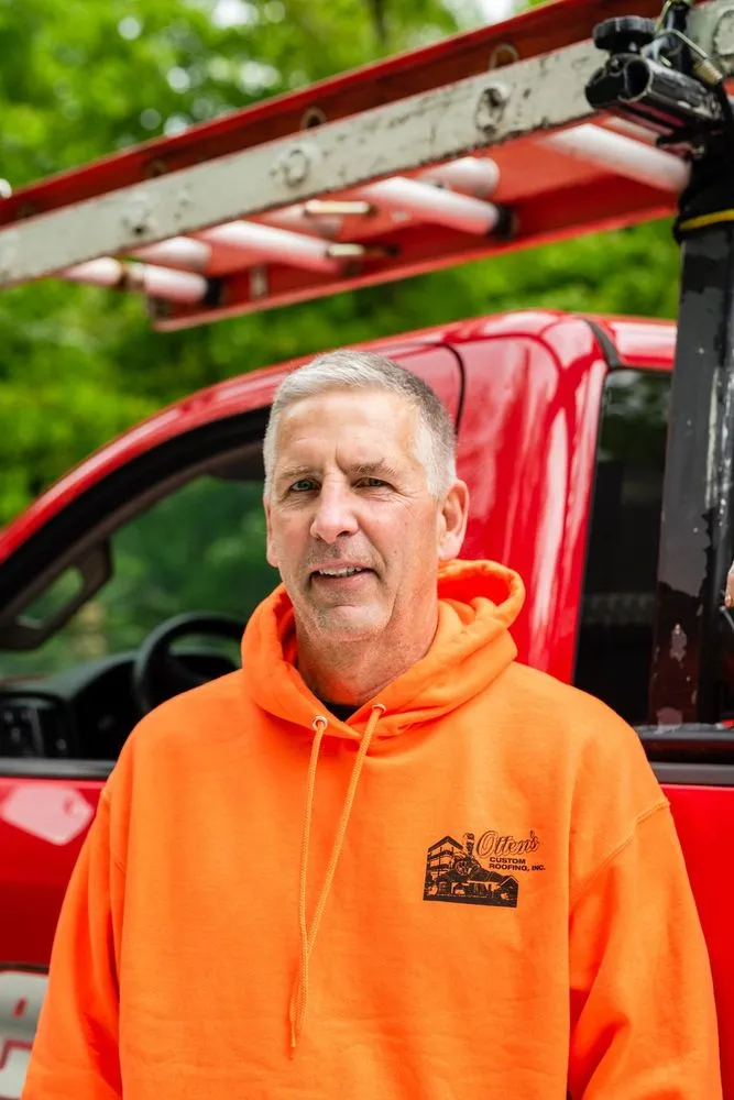 Slide of Otten's Custom Roofing