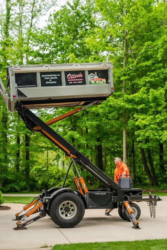 Slide of Otten's Custom Roofing