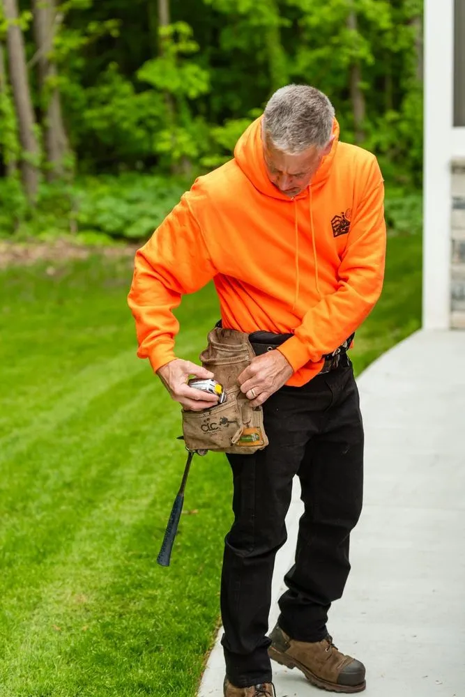 Slide of Otten's Custom Roofing