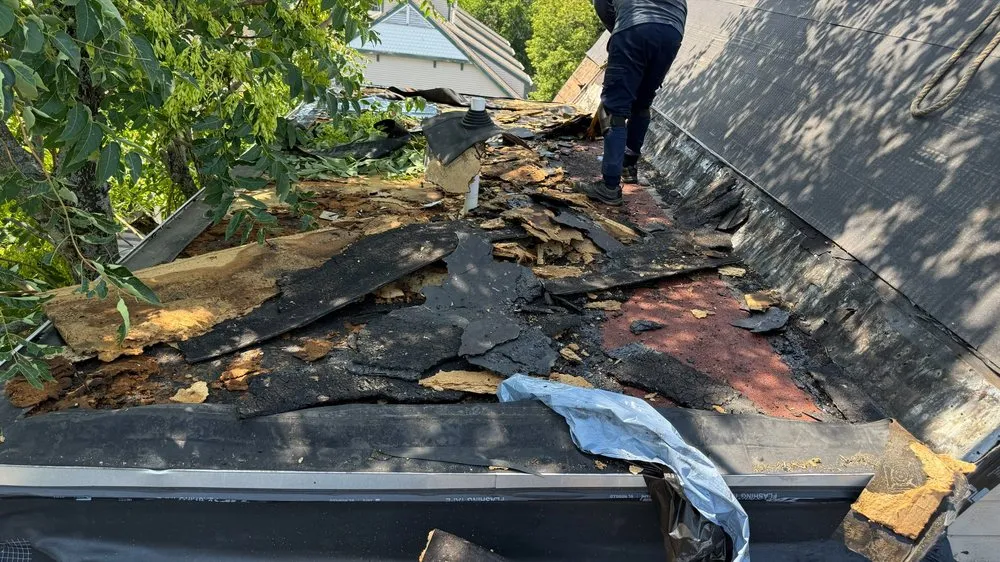 Slide of Otukan Roofing